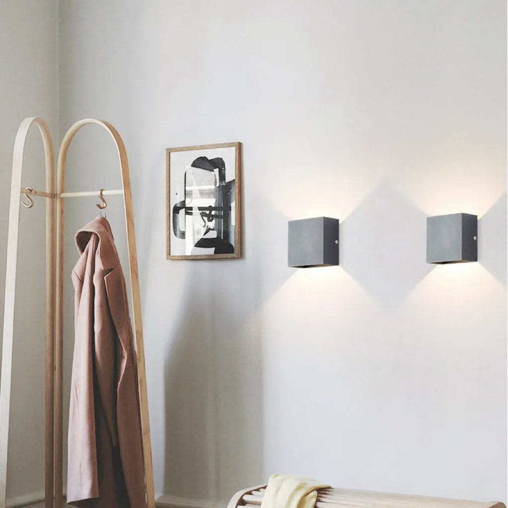 Modern waterproof LED outdoor light, stylish black finish, ideal for patios, porches, and entryways.