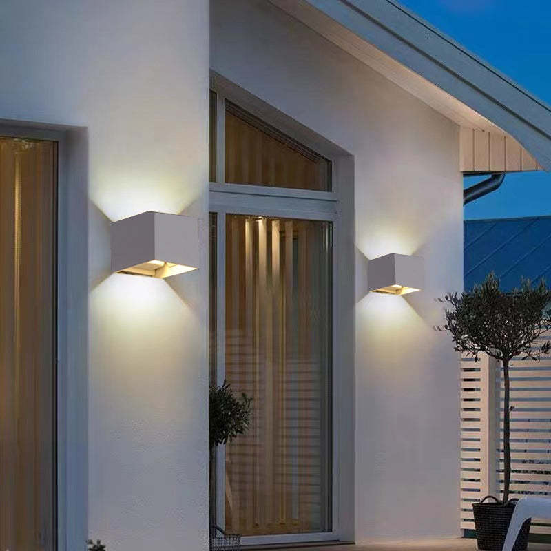 Sleek square LED outdoor light, ideal for garden, patio, or porch; durable & weatherproof.