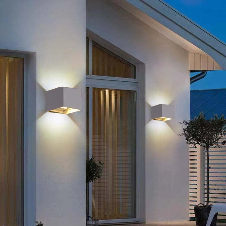 Sleek square LED outdoor light, ideal for garden, patio, or porch; durable & weatherproof.
