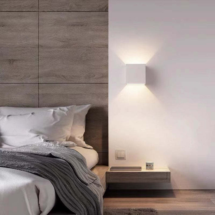 Adjustable beam LED outdoor wall lamp, square, providing focused illumination for security & style.