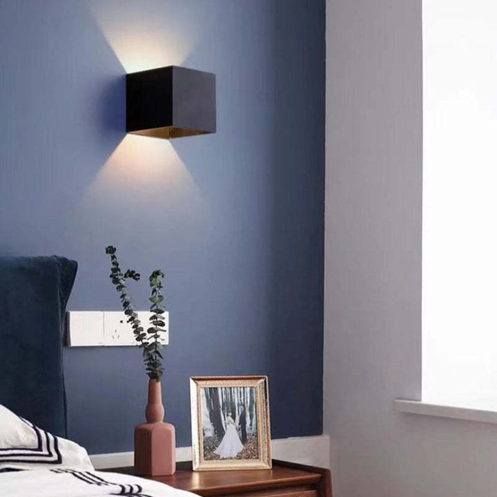 Home decor LED wall light, black finish, waterproof, perfect for modern exterior architectural lighting.