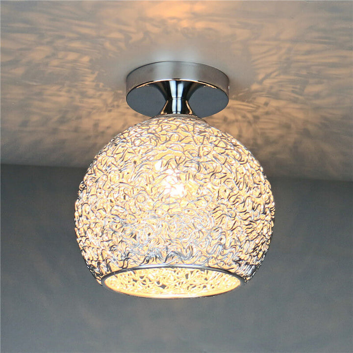 Modern LED semi-flush mount ceiling light with a dome shape, perfect for kids' rooms.