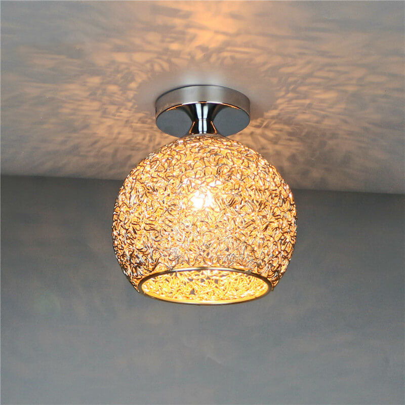 Safe and bright LED semi-flush mount ceiling fixture for a child's modern playroom.