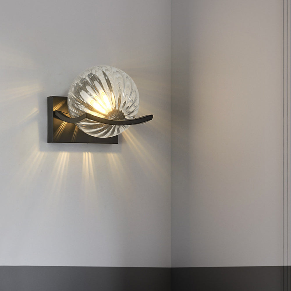 Glass and LED wall lamp, a contemporary fixture for stylish home lighting and wall decor.