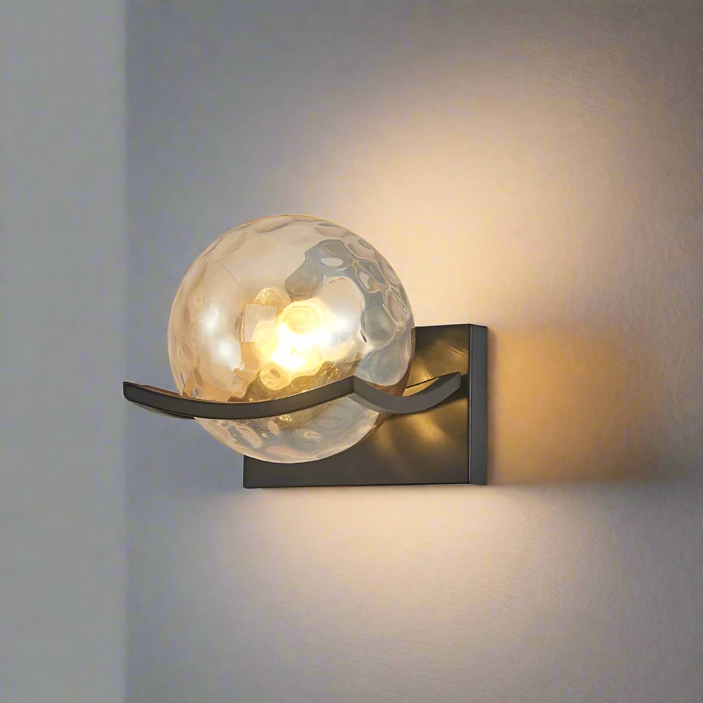 Elegant LED wall lamp featuring a clear glass design, offering soft and modern home lighting.