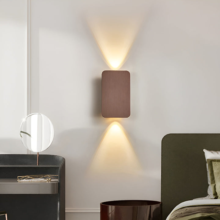 Sleek LED wall light casting ambient upward and downward light in a modern home