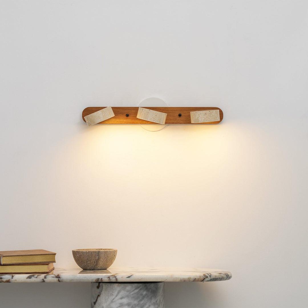 Elegant LED wall light, ambient and dimmable for ultimate bedroom comfort.