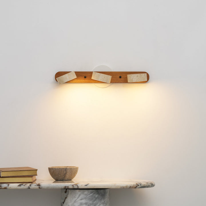 Elegant LED wall light, ambient and dimmable for ultimate bedroom comfort.