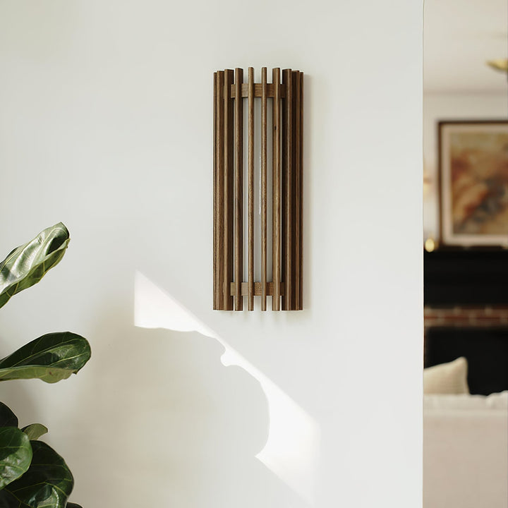 Aesthetic LED wall light with wood details and a soft glow acrylic diffuser.