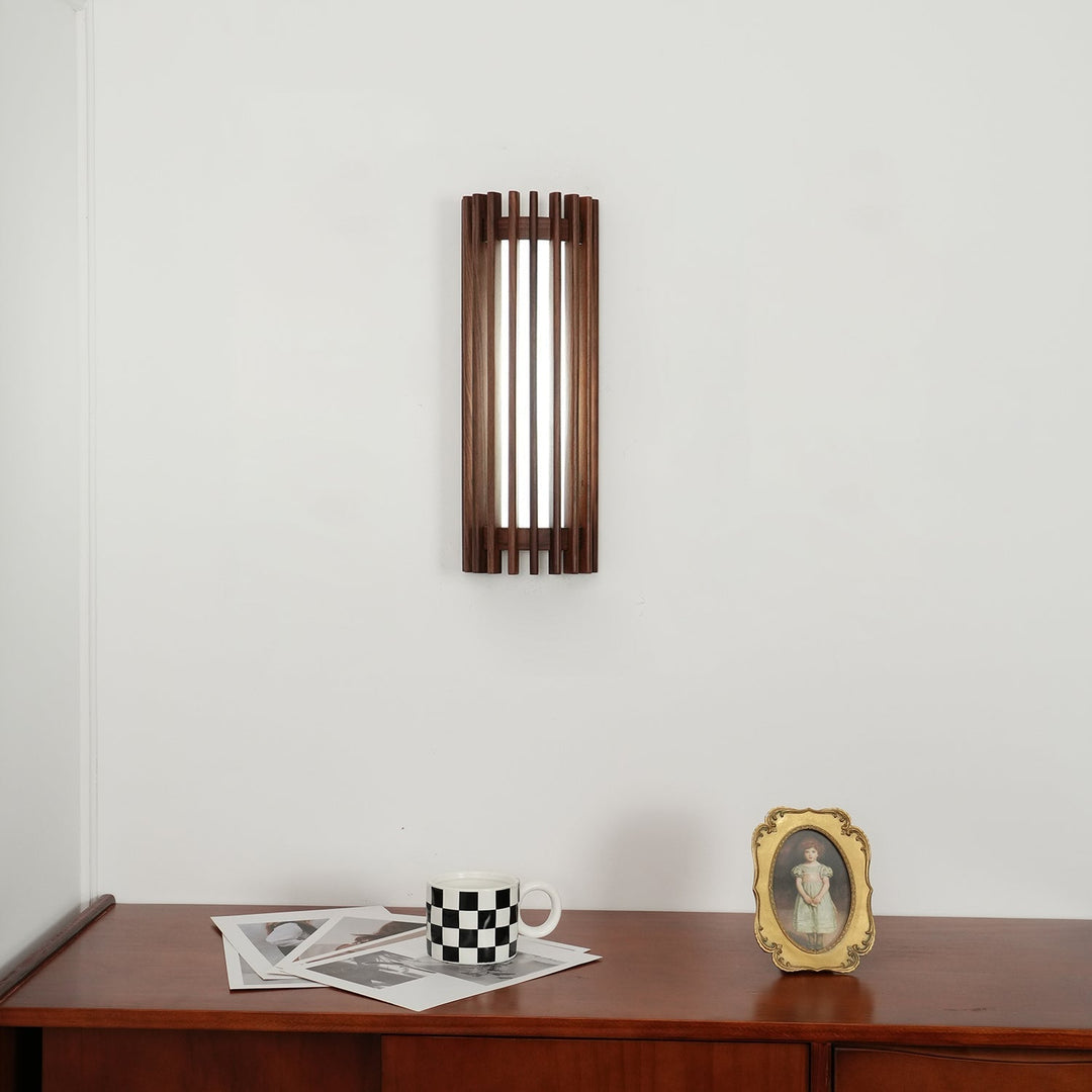 Sleek LED wall light for home decor, combining natural wood and frosted acrylic.