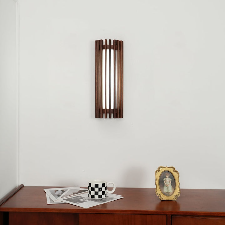 Sleek LED wall light for home decor, combining natural wood and frosted acrylic.