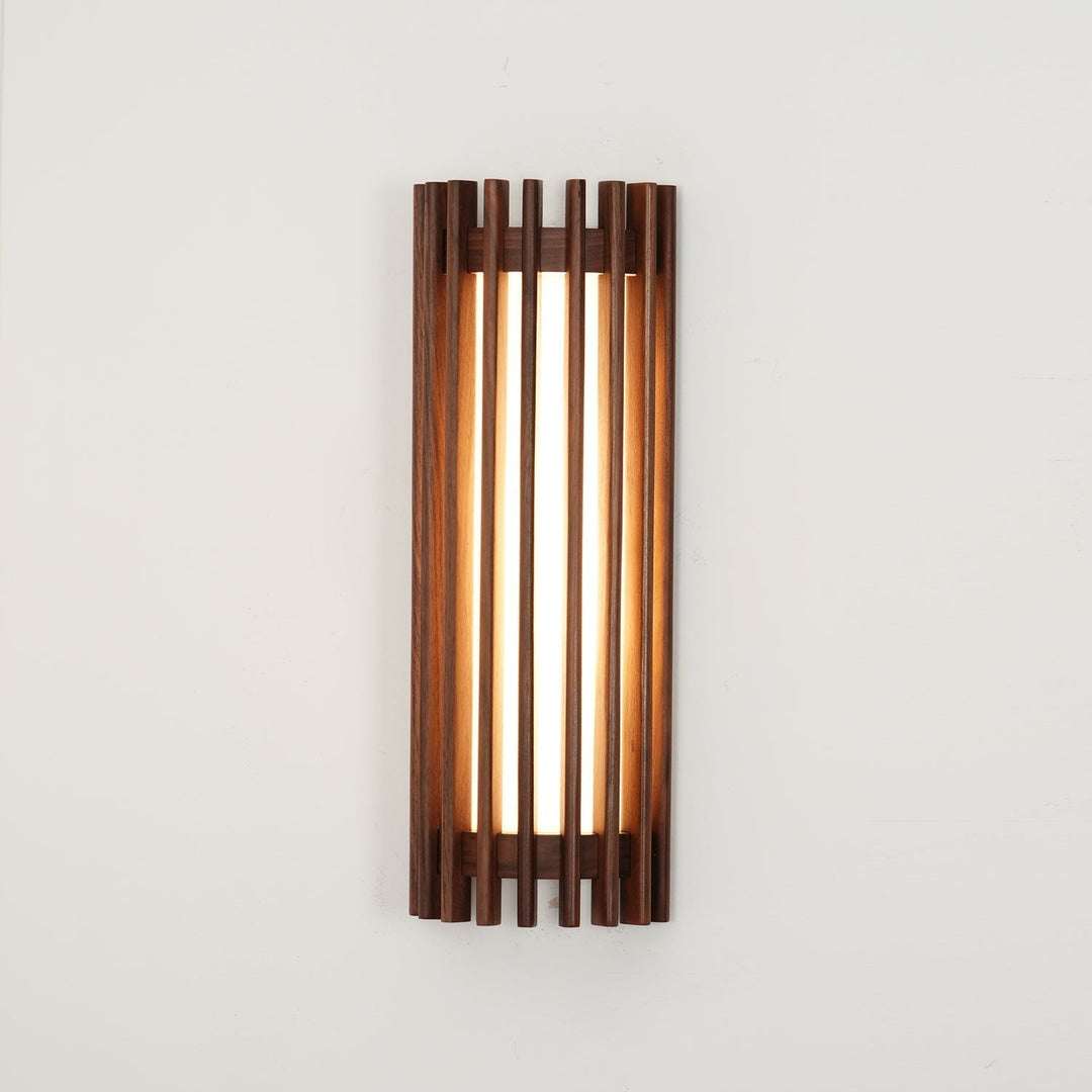 Modern LED wall sconce, wood and acrylic, providing efficient and beautiful room light.