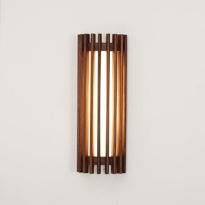 Modern LED wall sconce, wood and acrylic, providing efficient and beautiful room light.