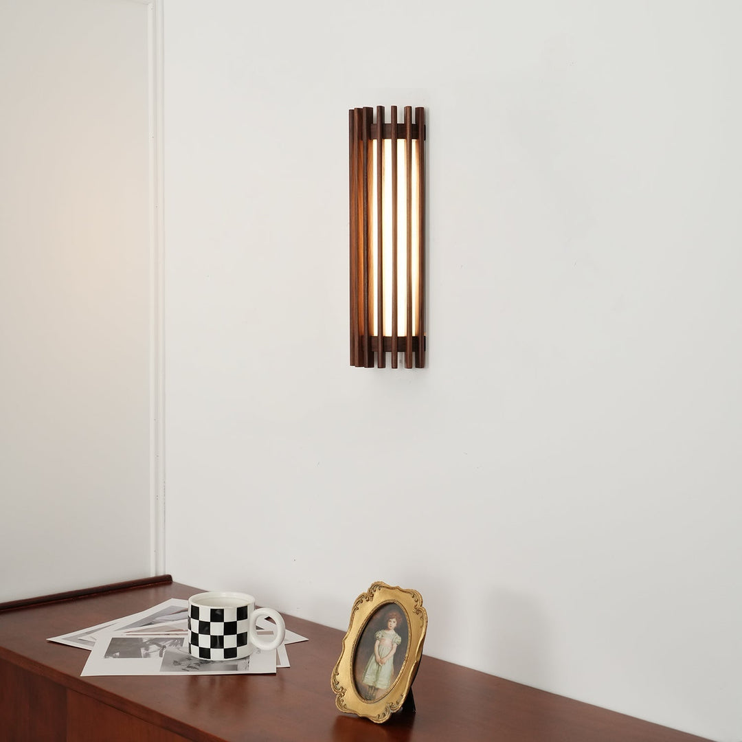 Elegant LED wall light, wood base, and acrylic light panel, for a serene bedroom.