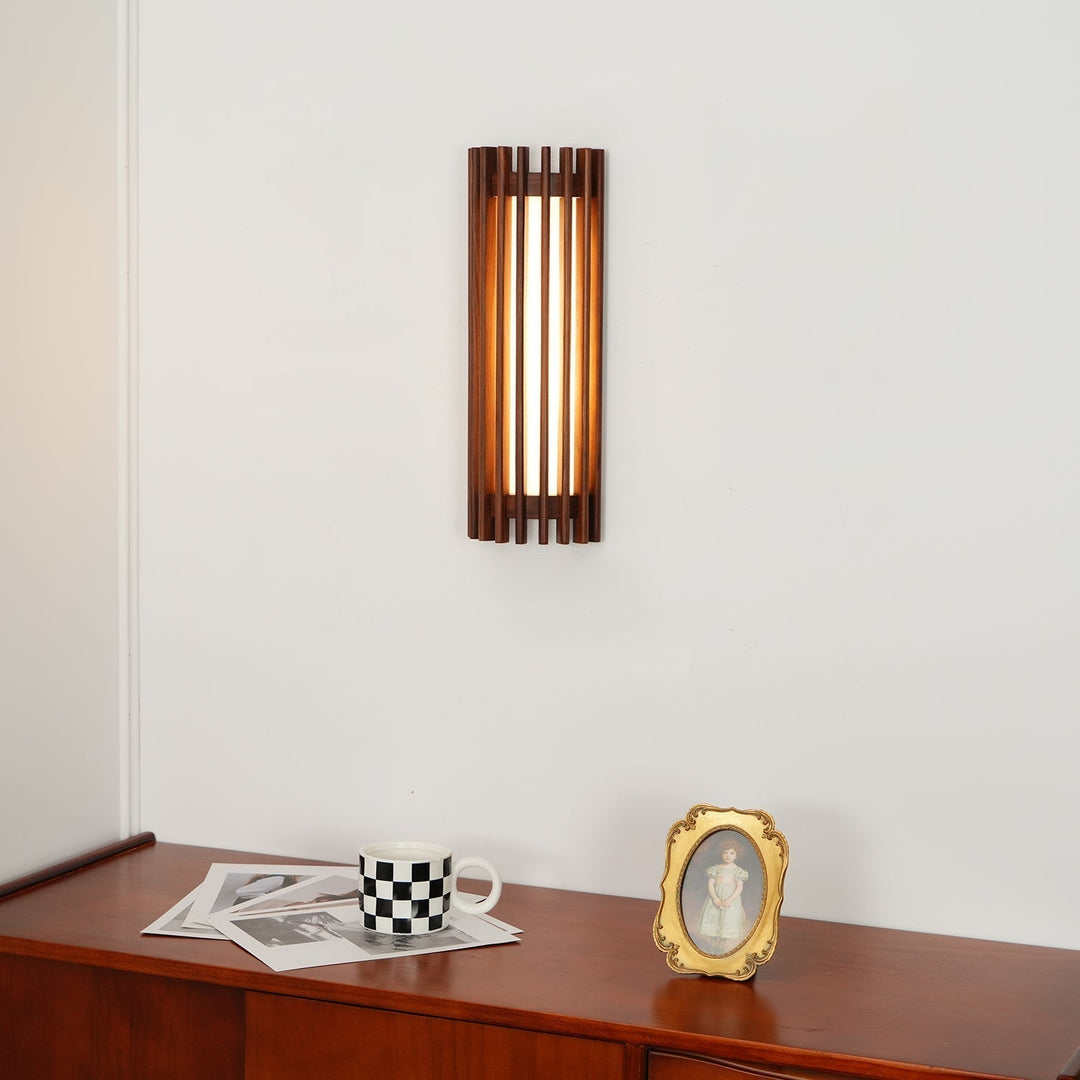 Elegant LED wall light, wood and acrylic design, provides warm ambient light in any room.