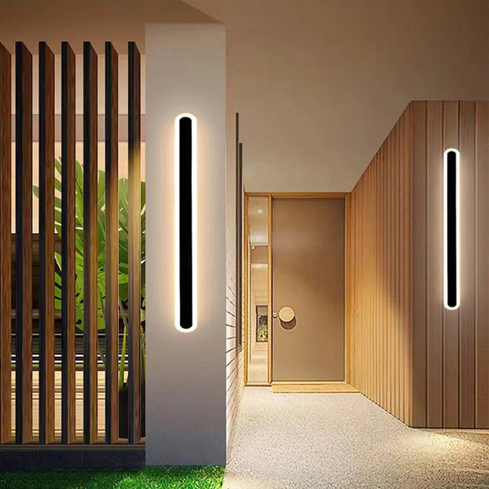Contemporary linear exterior wall lamp for modern homes, energy-efficient LED, bright illumination.