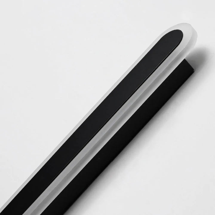 Contemporary linear outdoor wall light, LED technology, modern aesthetic, motion activated.