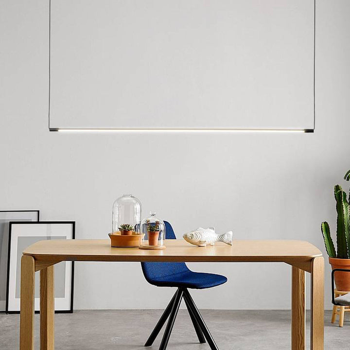 Versatile modern linear LED pendant light, featuring an adjustable design for perfect lighting.
