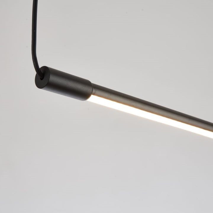 Contemporary linear LED pendant light fixture for modern dining rooms & stylish home interior.