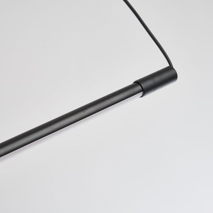 Minimalist modern linear LED pendant light, a chic ceiling fixture for bedroom or office.