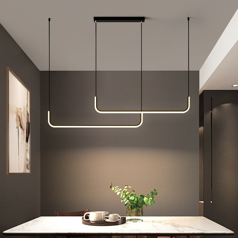 Simple yet sophisticated modern linear LED pendant light for minimalist dining & living rooms.