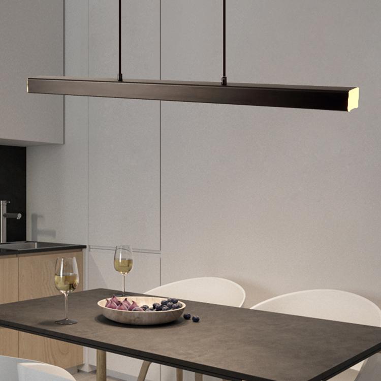 Stylish brown linear pendant light, an adjustable fixture for modern interior decor.