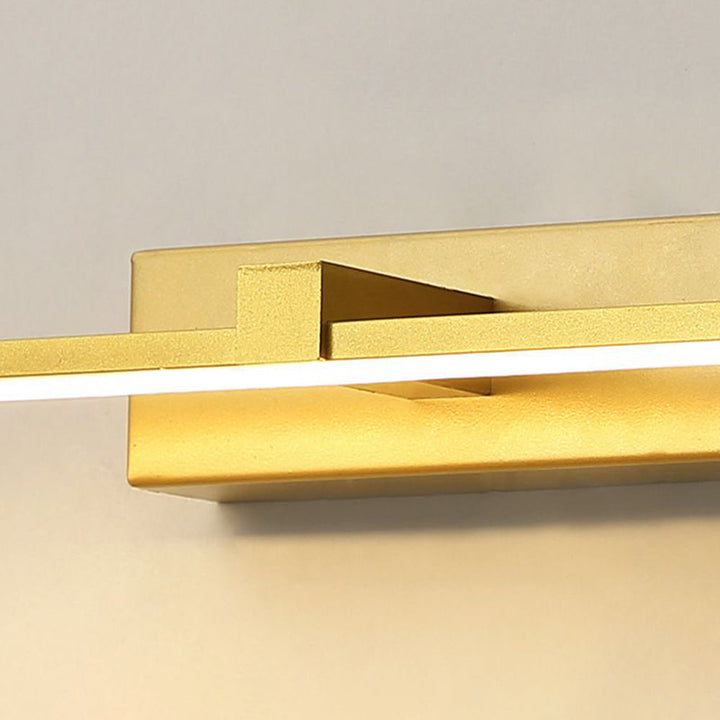 Contemporary gold linear LED wall lamp, perfect for bedroom or bathroom.