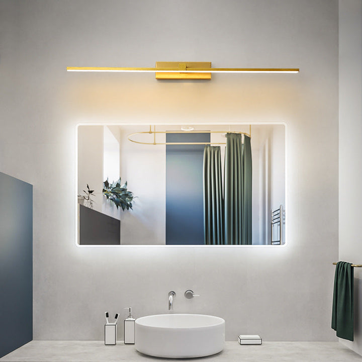 Modern linear LED vanity light with gold finish, hardwired for elegant bathrooms.
