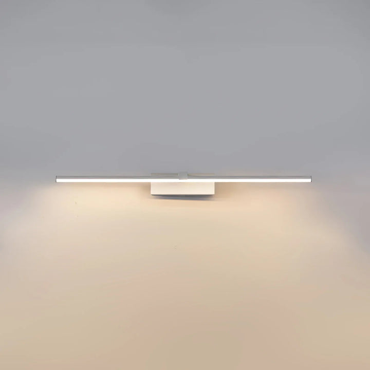 Modern linear LED sconce in black, perfect for bedroom or bathroom ambiance.