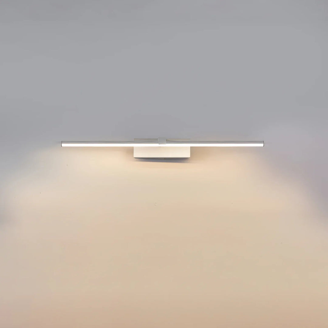 White linear LED vanity lamp, contemporary design for modern bathroom lighting.