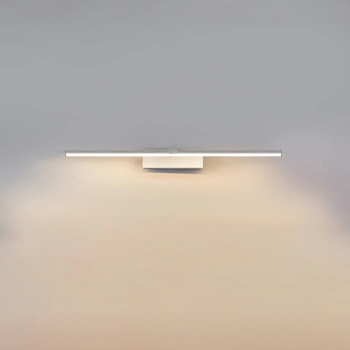 White linear LED vanity lamp, contemporary design for modern bathroom lighting.