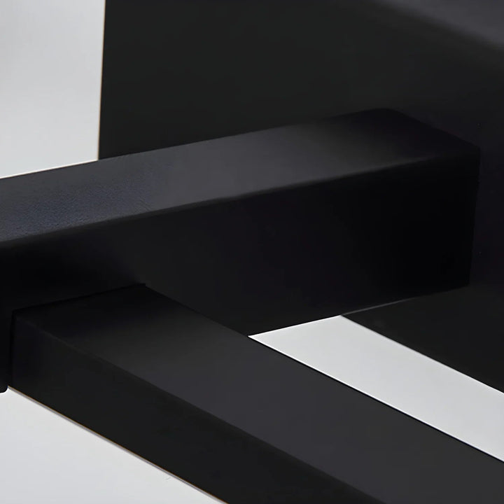 Black modern linear LED wall sconce for contemporary bedroom lighting.