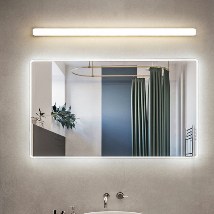 Contemporary damp-rated LED wall light for bathroom mirrors, perfect vanity illumination.