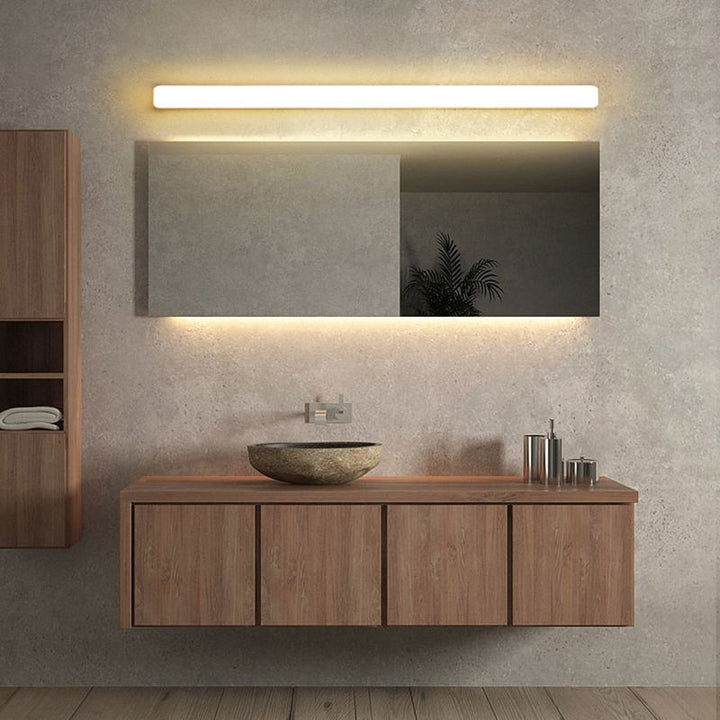 Sleek modern linear LED sconce, ideal ambient lighting for bathroom and bedroom decor.