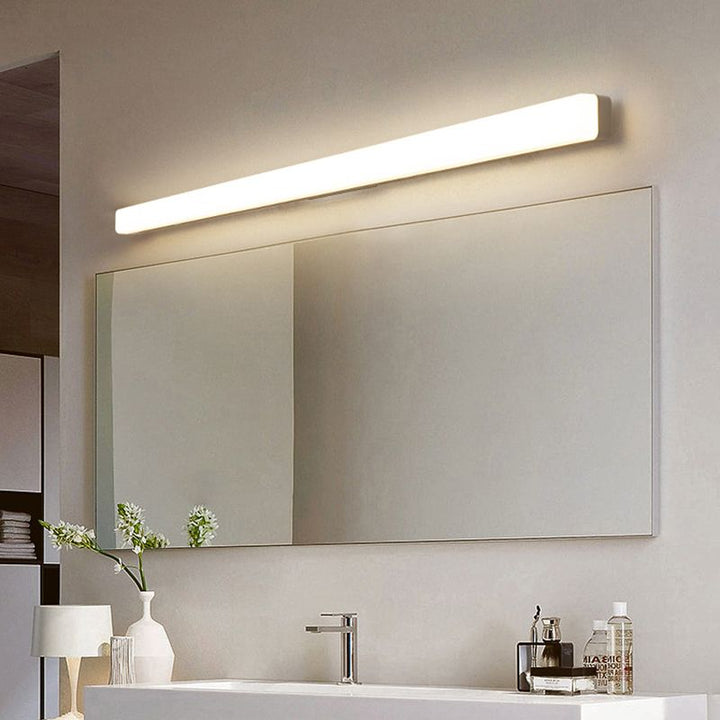 Damp-rated modern LED wall light, perfect for bathroom, vanity, and mirror lighting.