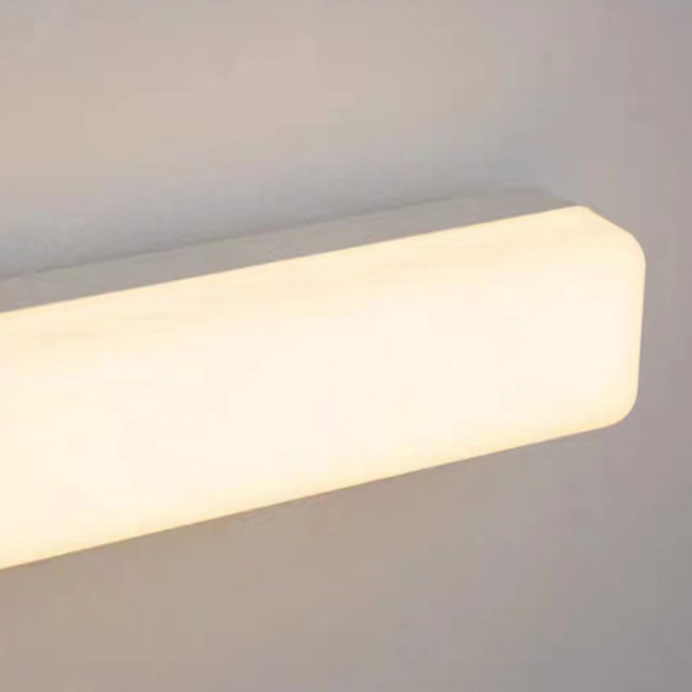Stylish contemporary LED wall sconce, suitable for bathroom, bedroom, and vanity lighting.