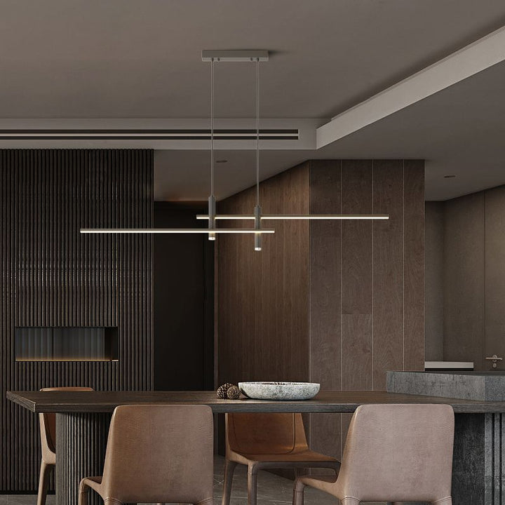 Long linear pendant light, modern LED lighting for a dining table.