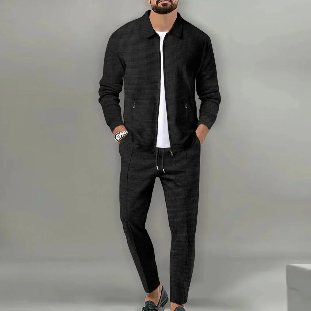 Modern men's slim fit two-piece suit, perfect for business, weddings & formal events. Includes tailored blazer & trousers.