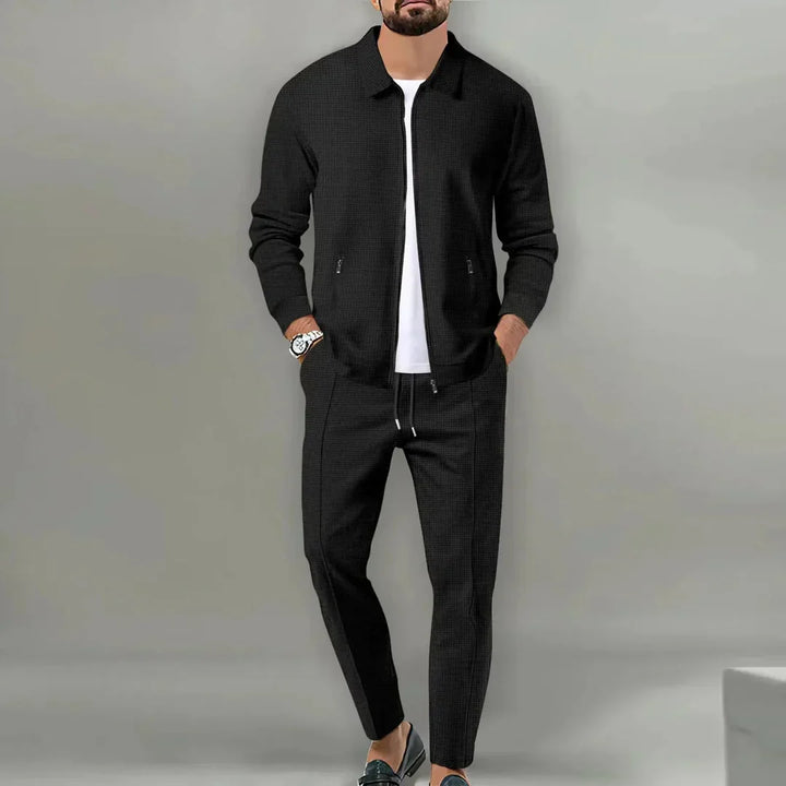 Modern men's slim fit two-piece suit, perfect for business, weddings & formal events. Includes tailored blazer & trousers.