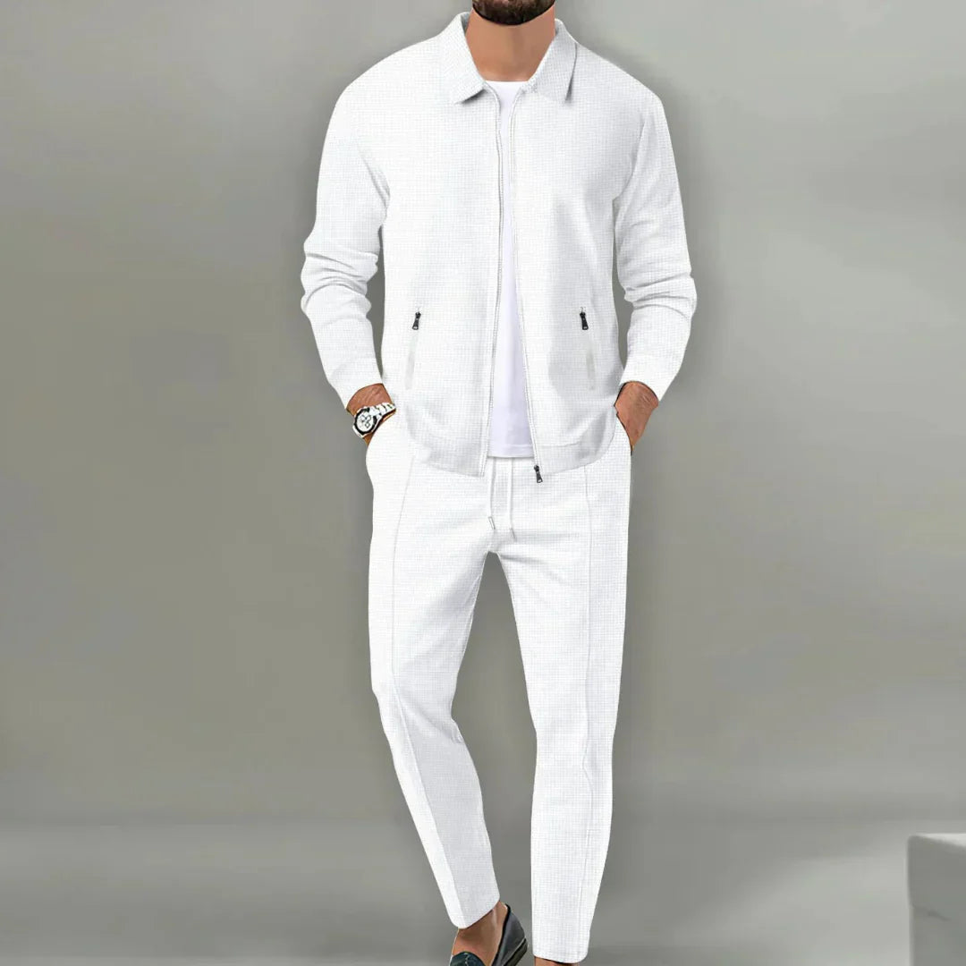Stylish men's tailored slim fit suit. A modern two-piece blazer & trousers combo, perfect for elegant formal wear.