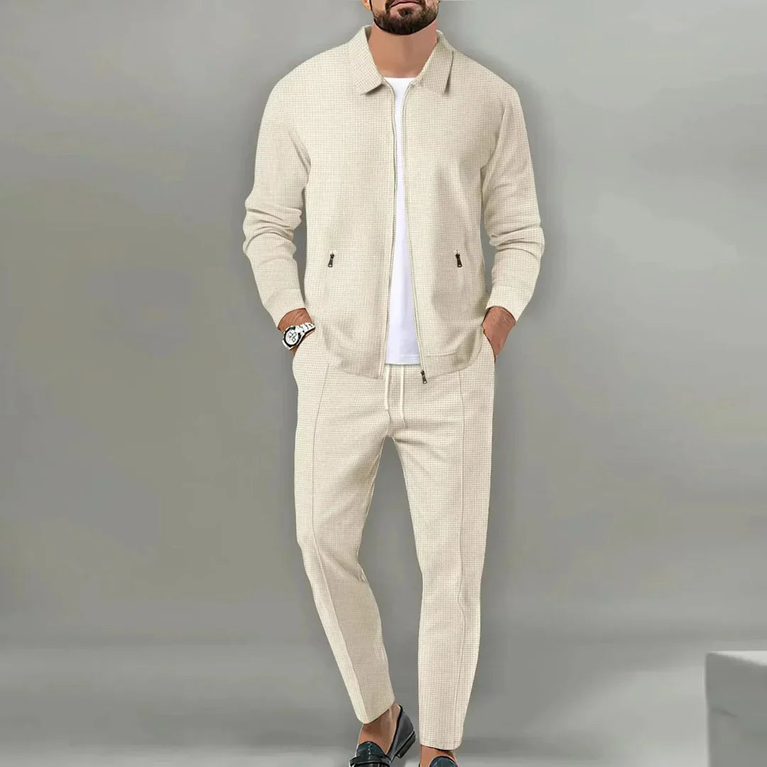 Elegant men's two-piece slim fit suit, designed for a sharp modern look. Includes a versatile blazer & matching trousers.