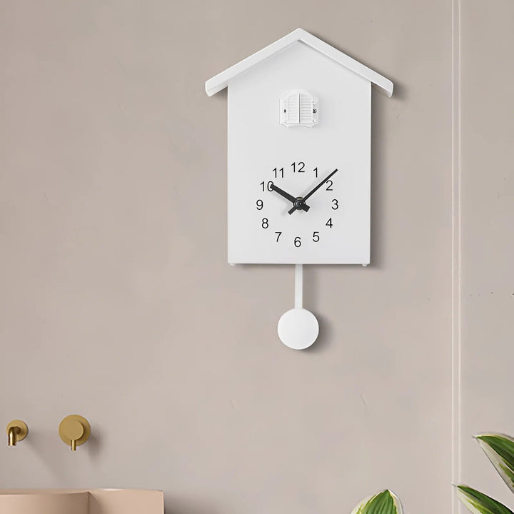 Sleek minimalist cuckoo wall clock. A silent, contemporary home accent for modern decor in living rooms & offices.