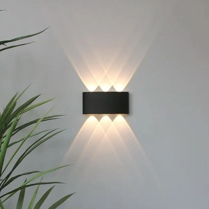 Outdoor minimalist LED fixture, ideal as a patio light or garden accent lighting.