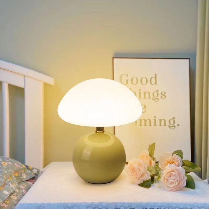 Stylish modern mushroom lamp, ideal bedroom lighting with adjustable LED colors & contemporary design.
