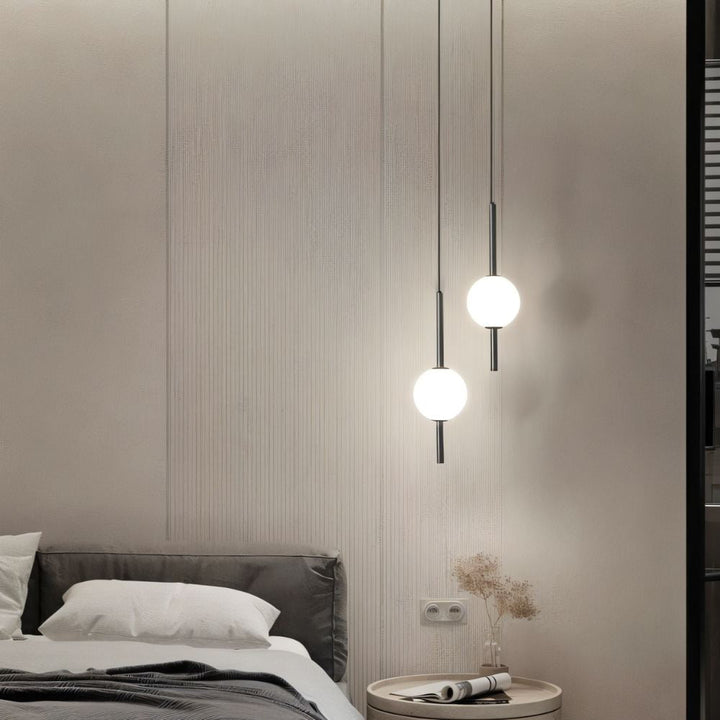 Versatile LED pendant light, Nordic design in black & brass, enhancing modern home illumination.