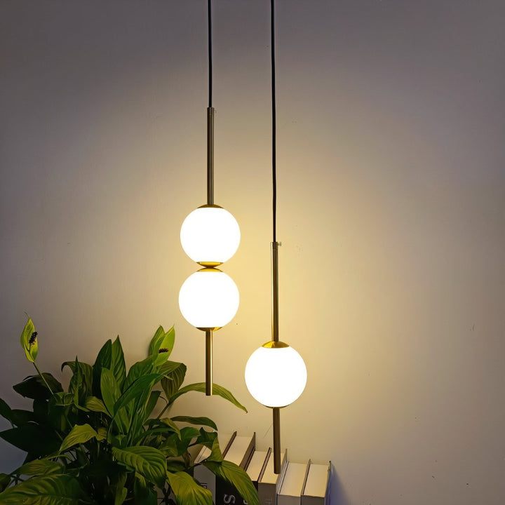 Black & brass modern Nordic LED ceiling lamp, a designer pendant light for chic interior decor.