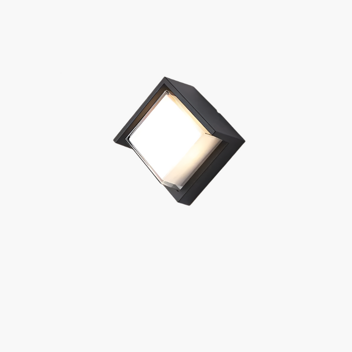 Black modern outdoor wall lamp, LED with motion sensor. Durable & weatherproof exterior light for gardens.