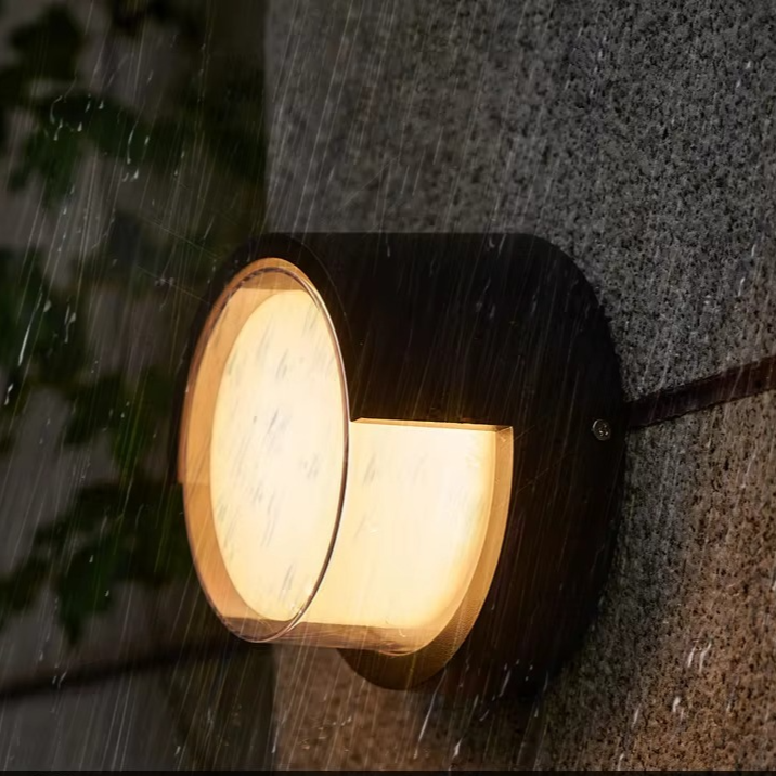 Contemporary aluminum outdoor wall lamp. LED motion sensor light, perfect for modern garden & patio lighting.