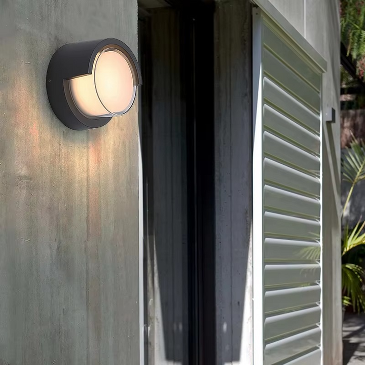 Stylish modern outdoor wall lamp. LED motion sensor lighting, durable aluminum for patio & security.