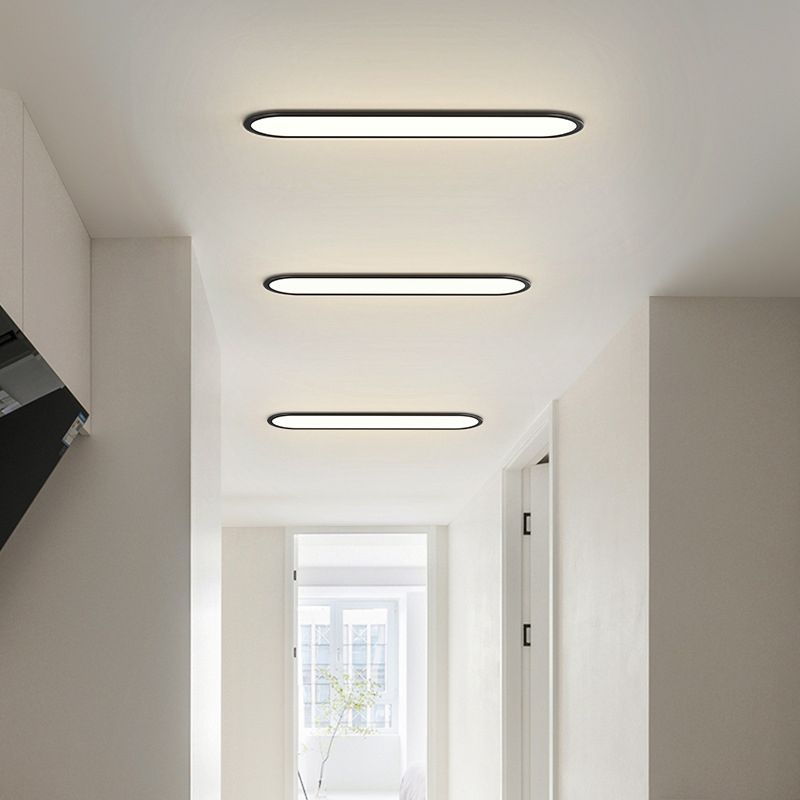 Dining room modern oval LED flush mount ceiling light, energy-efficient & stylish decor.